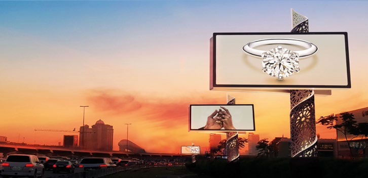 Digital billboard on a Dubai highway at sunset